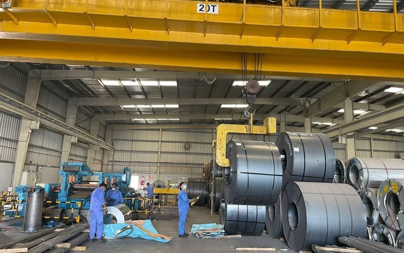 Steel and industrial trading imagery from the company profile